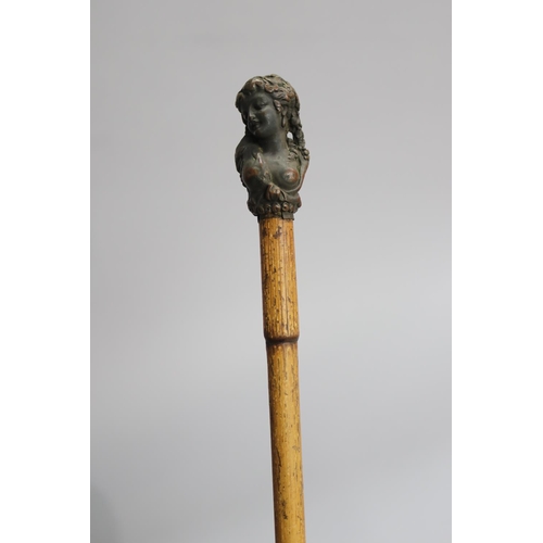 Walking stick mounted with a cast bronze female term, approx 88cm L