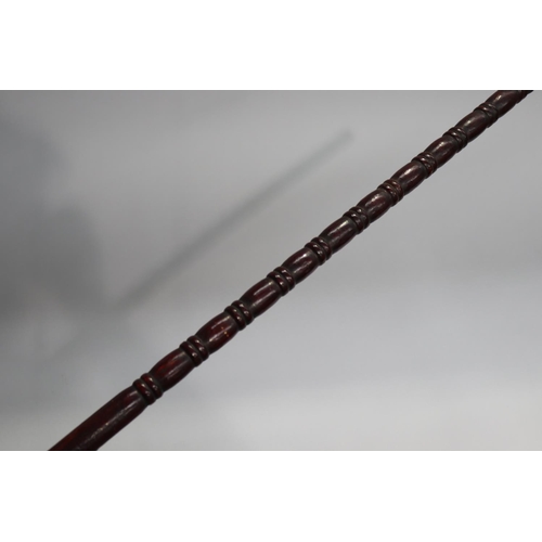 22 - Fist hand walking stick, marked 1882, with later shaft, approx 80cm L