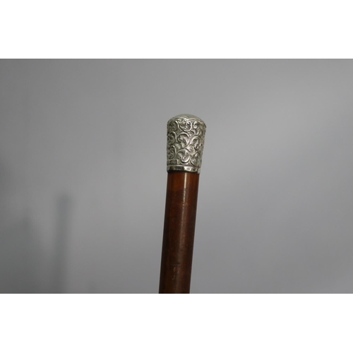 25 - Silver mounted walking stick, approx 91cm L