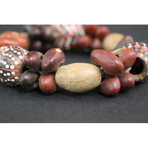 3009 - Lisa Pultara (c1959-.) Australia (Aboriginal deceased) Painted bracelet, bean tree & gumnut, 87, Anm... 