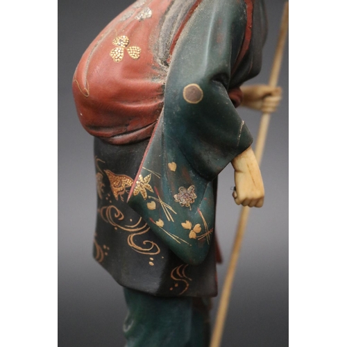 7 - Fine antique Japanese lacquer & ivory okimono of an elderly lady, signed to base RYUICHI, total appr... 