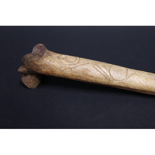 70 - Large old New Guinea carved bone dagger, Primative incised decoration, approx 41cm L