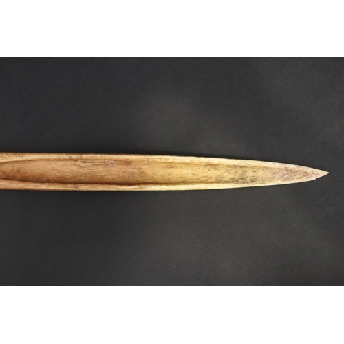 70 - Large old New Guinea carved bone dagger, Primative incised decoration, approx 41cm L