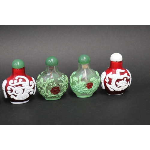 73 - Eleven Chinese Peking over lay glass snuff bottles, approx 7cm H and shorter (11)