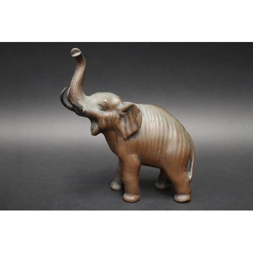 98 - Well cast bronze figure of an elephant, approx 20cm H x 18cm W