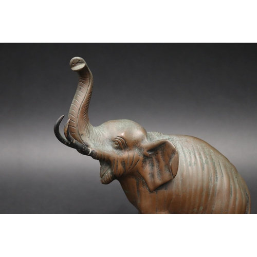 98 - Well cast bronze figure of an elephant, approx 20cm H x 18cm W