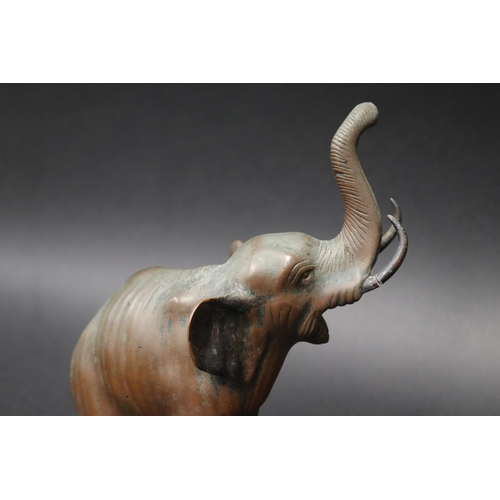 98 - Well cast bronze figure of an elephant, approx 20cm H x 18cm W