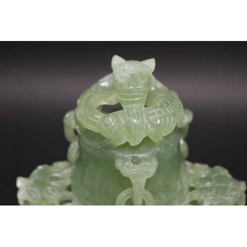 133 - Early 20th century Asian carved pale green jade lidded censer, mask head drop rings, approx 17cm H x... 