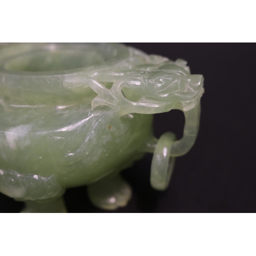 133 - Early 20th century Asian carved pale green jade lidded censer, mask head drop rings, approx 17cm H x... 