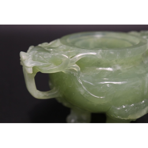 133 - Early 20th century Asian carved pale green jade lidded censer, mask head drop rings, approx 17cm H x... 