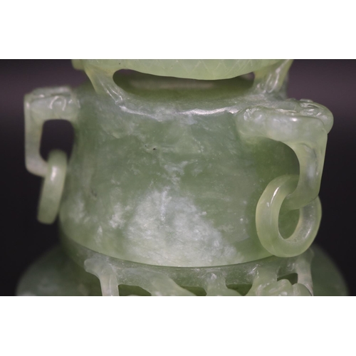 133 - Early 20th century Asian carved pale green jade lidded censer, mask head drop rings, approx 17cm H x... 