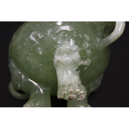 133 - Early 20th century Asian carved pale green jade lidded censer, mask head drop rings, approx 17cm H x... 