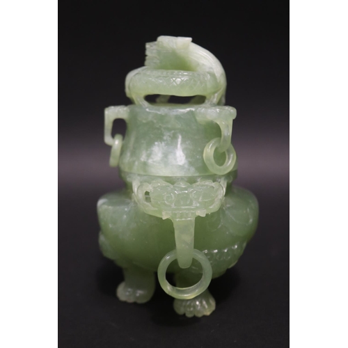 133 - Early 20th century Asian carved pale green jade lidded censer, mask head drop rings, approx 17cm H x... 