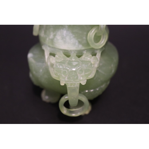 133 - Early 20th century Asian carved pale green jade lidded censer, mask head drop rings, approx 17cm H x... 