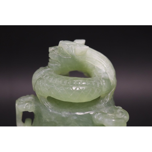 133 - Early 20th century Asian carved pale green jade lidded censer, mask head drop rings, approx 17cm H x... 