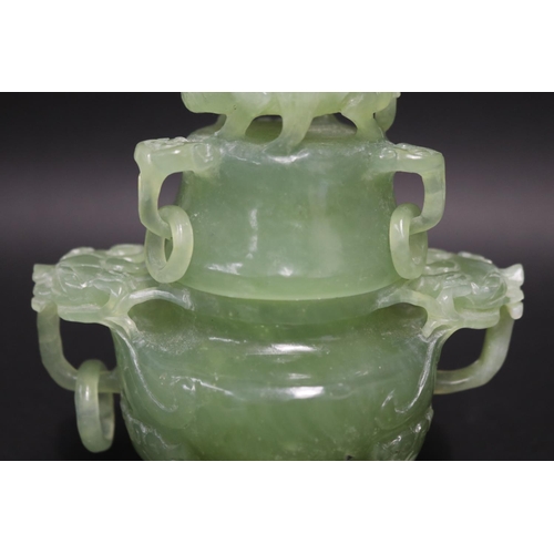 133 - Early 20th century Asian carved pale green jade lidded censer, mask head drop rings, approx 17cm H x... 