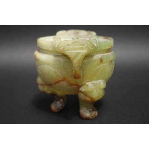 134 - Chinese jade tri legged censer, with double lion mask handles, no lid, approx 13cm H x 18cm W