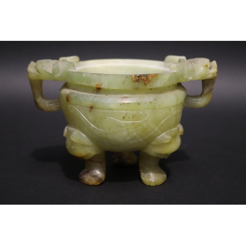 134 - Chinese jade tri legged censer, with double lion mask handles, no lid, approx 13cm H x 18cm W