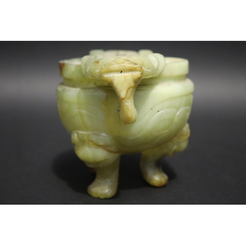 134 - Chinese jade tri legged censer, with double lion mask handles, no lid, approx 13cm H x 18cm W