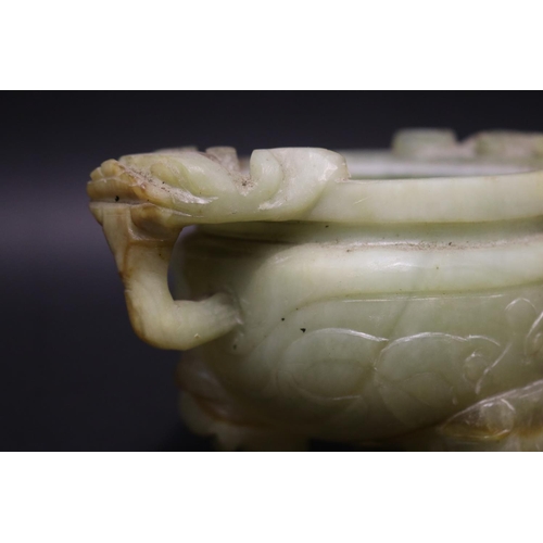 134 - Chinese jade tri legged censer, with double lion mask handles, no lid, approx 13cm H x 18cm W