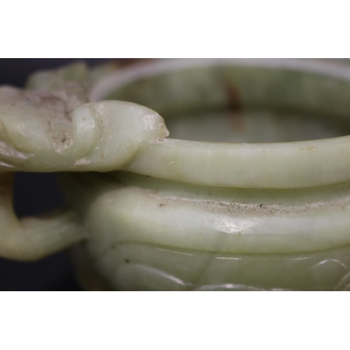 134 - Chinese jade tri legged censer, with double lion mask handles, no lid, approx 13cm H x 18cm W