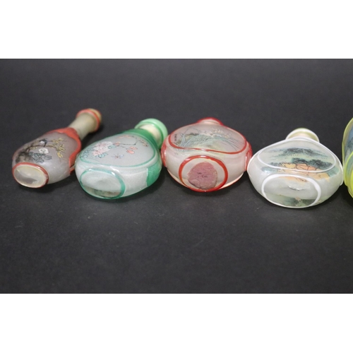 137 - Six Chinese over lay glass reverse painted snuff bottles, approx 9cm H and shorter (6)