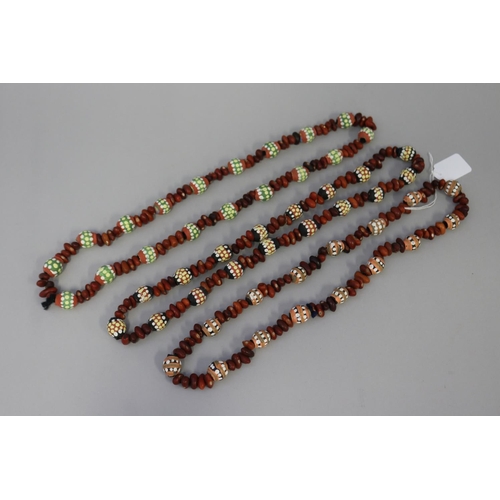 3090 - Three similar length Aboriginal hand painted bead necklaces , circa 1980's  Napperby station  (3)