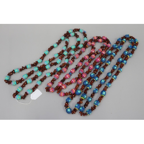 3092 - Three long length colorful Australian Aboriginal painted gum nut and bead necklaces (3) circa 1980's... 