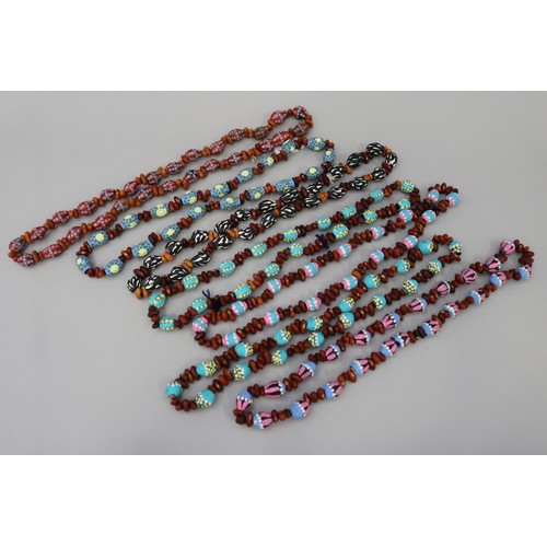 3095 - Assorted length Australian Aboriginal painted gum nut & bead necklaces, circa 1980's, Napperby stati... 