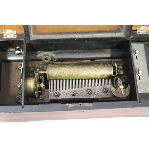 24 - Antique Swiss cylinder music box, in working order at time of inspection, approx 13.5cm H x 45cm W x... 