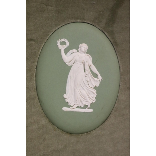 30 - Two wedgwood framed oval green jasper medallions, each approx 13cm x 10cm medallion size. (2)