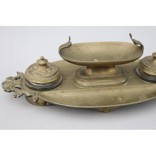54 - Antique French bronze double pot inkstand with central urn form pen holder, marked HP to base, appro... 