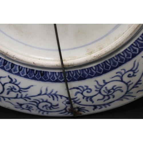 56 - Large Japanese blue & white charger depicting tiger and people in a forest, approx 46cm Dia