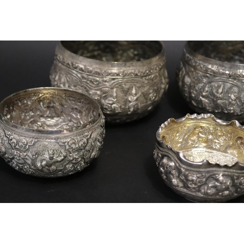 111 - Lot of five South East Asian silver bowls, approx 8cm H x 13cm Dia and smaller and approx 621 grams.... 