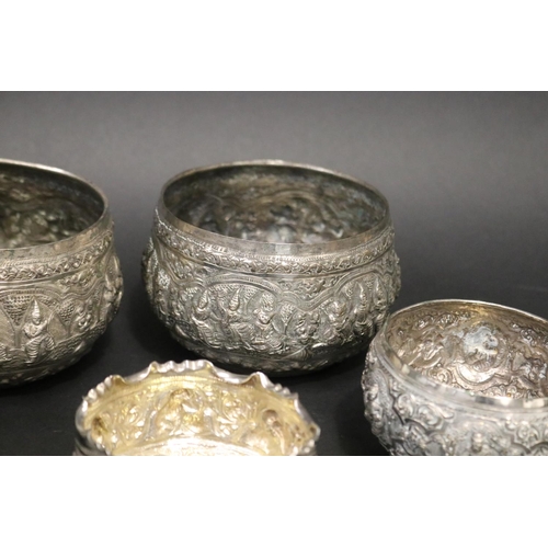 111 - Lot of five South East Asian silver bowls, approx 8cm H x 13cm Dia and smaller and approx 621 grams.... 