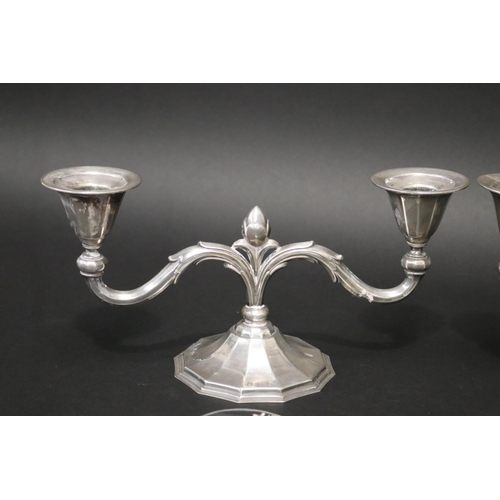 112 - Pair of Danish silver two stick candelabra, in the Jensen style dated 1937 by Danish silversmith Joh... 