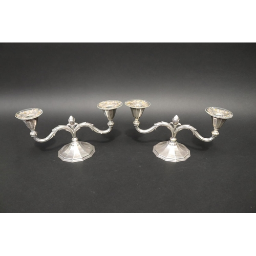 112 - Pair of Danish silver two stick candelabra, in the Jensen style dated 1937 by Danish silversmith Joh... 