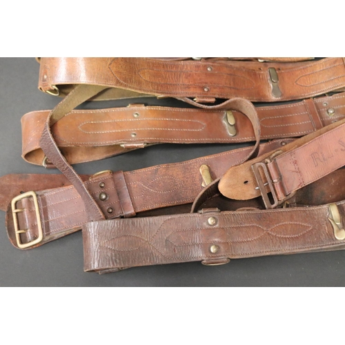 82 - Good selection of antique leather Officers WWI belts