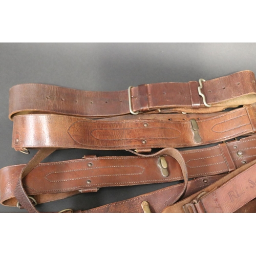 82 - Good selection of antique leather Officers WWI belts