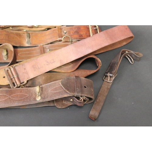 82 - Good selection of antique leather Officers WWI belts