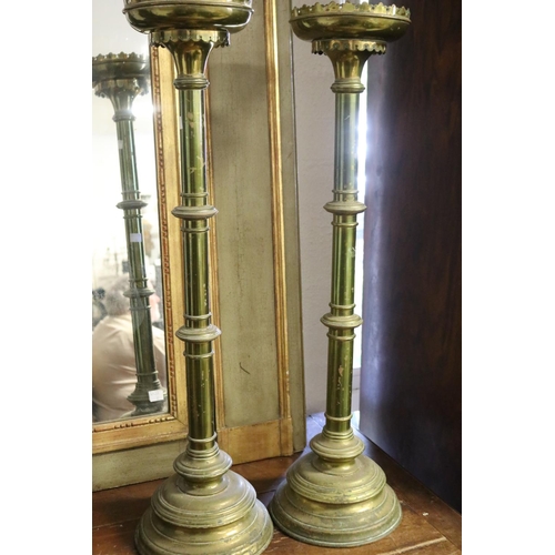 339 - Tall pair of antique brass church prickets lamp bases. weighted bases, castellated top rims, each ap... 
