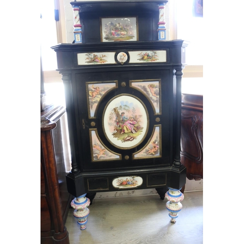 377 - Antique Continental, most likely German, ebonized cabinet with porcelain panels  legs,  brass mounts... 