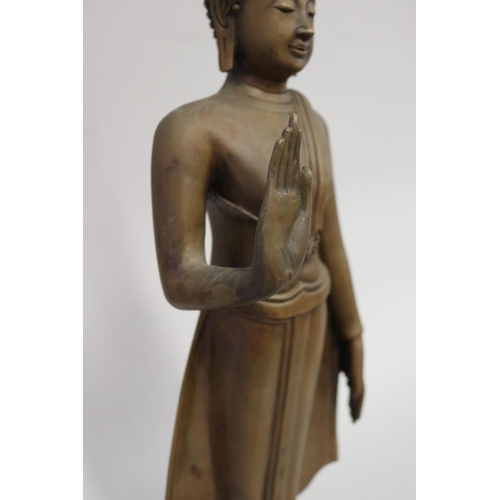 302 - Decorative Thai brass standing buddha,  hexagonal base, approx 59cm H including base