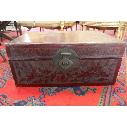 386 - Antique Chinese red lacquer trunk, approx 28cm H x 64cm W x 43cm D