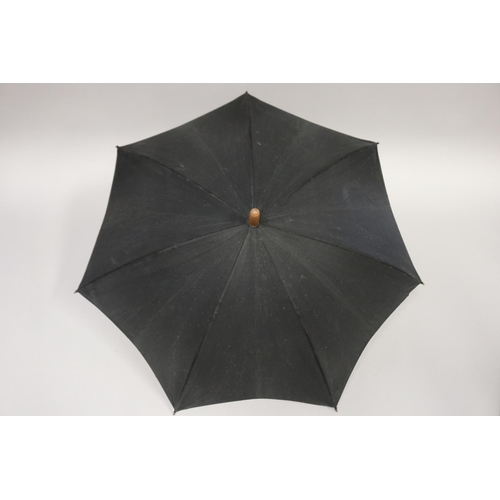 412 - Ex Viola Hordern - ladies parasol, bamboo handle, the tube conceals the parasol, with original studi... 