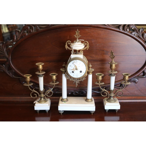113 - Antique French white marble and brass clock and matching three stick candelabra (garniature), no key... 