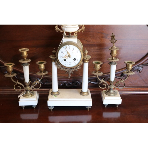 113 - Antique French white marble and brass clock and matching three stick candelabra (garniature), no key... 