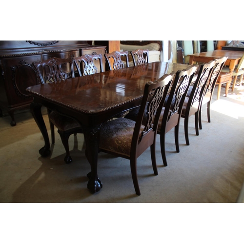 126 - Vintage Chippendale revival dining suite comprising an extension dining table, and matching set of e... 