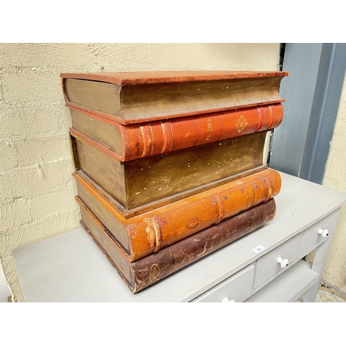 135 - Large faux stack of leather spine books, with lift up top box, and single drawer below, approx 52.5c... 