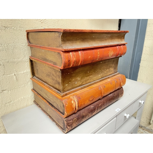 135 - Large faux stack of leather spine books, with lift up top box, and single drawer below, approx 52.5c... 